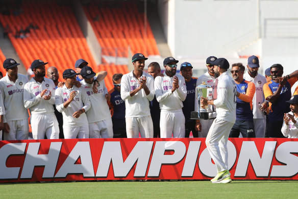 Virat Kohli and his teammates celebrate India’s victory in the fourth Test against England in Ahmedabad.