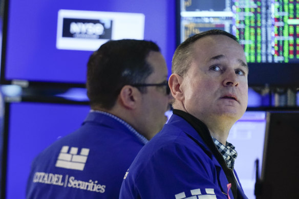 Traders on the New York Stock Exchange: The surge in bond yields rings a warning bell for investors. 