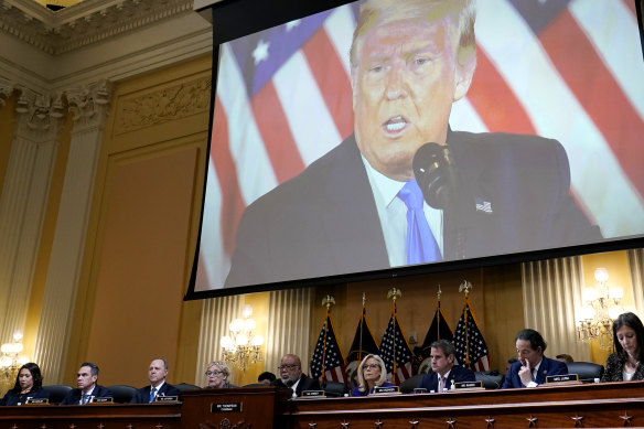 A video of former US president Donald Trump is displayed as members of the House select committee to investigating the January 6 attack on the US Capitol held its last public meeting on December 19.