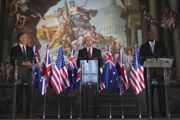 UK Defence Secretary John Healey, centre, US Secretary of Defence Lloyd Austin, right, and Australian Defence Minister Richard Marles, left, speak during a press conference at the AUKUS Defence Ministers Meeting at Old Royal Naval College, Greenwich.