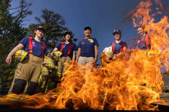 Firefighter Bronnie Mackintosh (centre) with camp participants (from left) Bridie Newman, Caitlin Weppner, Claire Schultz and Annabelle Forsyth.