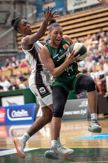 Ranger danger: Dandenong's Betnijah Laney muscles her way to the basket against Townsville’s Laurin Mincy.