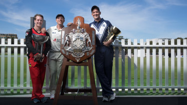 Sam Harper, Marcus Harris and Chris Tremain with with Victoria's trophies from this season.