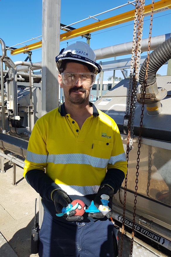 Sydney Water worker Courtney Mahar displaying some of the strange items flushed down sinks and toilets. 