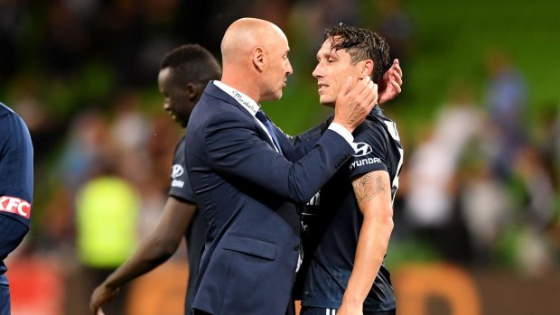 Coach Kevin Muscat with former player Mark Milligan.