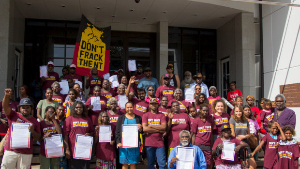 Anti-fracking protesters gathered on Darwin’s parliament steps to rally against fracking in 2017. 
