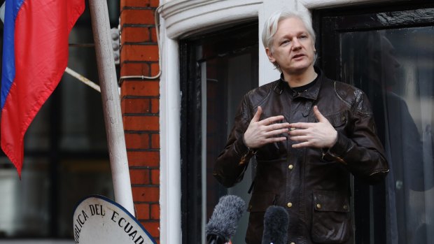 Julian Assange speaks from a balcony at the Ecuadorian embassy in London.