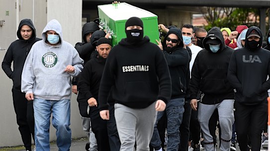Mourners carry the coffin of Bilal Hamze into the Lakemba Mosque during his funeral service on Wednesday. 