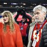 Taylor Swift waves as she walks with Ed Kelce after the AFC Championship NFL football game between the Baltimore Ravens and the Kansas City Chiefs, Sunday, Jan. 28, 2024, in Baltimore. The Chiefs won 17-10. (AP Photo/Nick Wass)