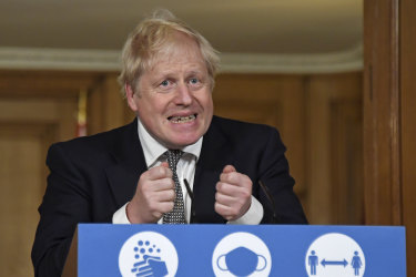 Prime Minister Boris Johnson announces the lockdown during a Downing Street press conference.