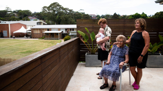 Ninety-nine year old Lillian Morton, pictured with daughter Nerida Walton, grandson Jarrod Walton and great-grandson, Reginald, at their Brookvale home, which is surrounded by St Augustine’s College.
