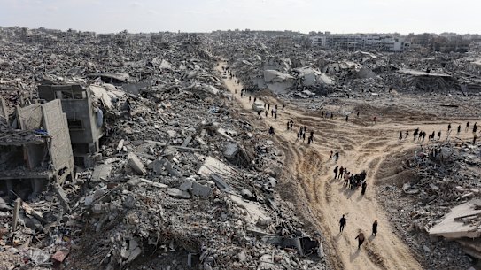 This aerial view shows displaced Palestinians returning to the war-devastated Jabalia refugee camp in the northern Gaza Strip on January 19, 2025, shortly before a ceasefire deal in the war between Israel and the Palestinian militant group Hamas was implemented. That ceasefire expired in March.