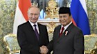 Russian President Vladimir Putin, left, and Indonesian Defense Minister and President-Elect Prabowo Subianto shake hands during their meeting at the Kremlin in Moscow, Russia, July 31, 2024. (Grigory Sysoyev, Sputnik, Kremlin Pool Photo via AP)