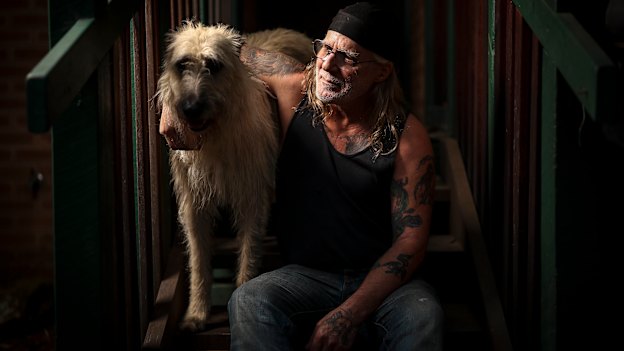 Bikie Stephen Mallet and his dog Tucker in Bright.