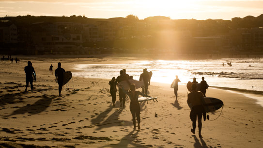 Surfers have returned to Bondi Beach, with restrictions slowly being eased across the state of NSW.