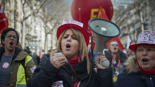 Members of the FO Union chant during demonstrations in Paris after French Unions called for a day of national strikes over the proposed reforms.