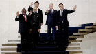 The BRICS brothers, left to right, South Africa’s President Cyril Ramaphosa, India’s Prime Minister Narendra Modi, China’s President Xi Jinping, Russia’s President Vladimir Putin and Brazil’s President Jair Bolsonaro wave to photographers during the BRICS Summit in Brasilia.