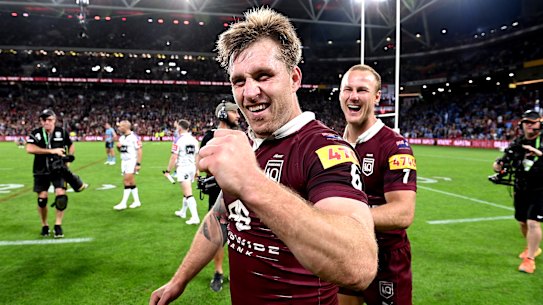 Cameron Munster and Daly Cherry-Evans celebrate Queensland’s Origin II victory.