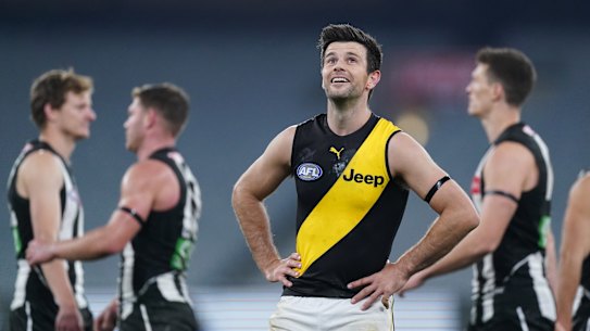 rent Cotchin of the Tigers reacts after the drawn result during the Round 2 AFL Match between the Collingwood Magpies and Richmond Tigers at the Melbourne Cricket Ground in Melbourne, Thursday, June 11, 2020. (AAP Image/Michael Dodge) NO ARCHIVING, EDITORIAL USE ONLY