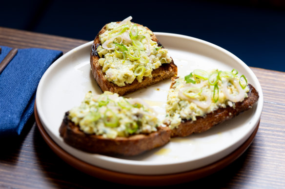 The go-to dish: Herring toast features chopped herring, eggs, pickled cucumbers, green apples and mustard.