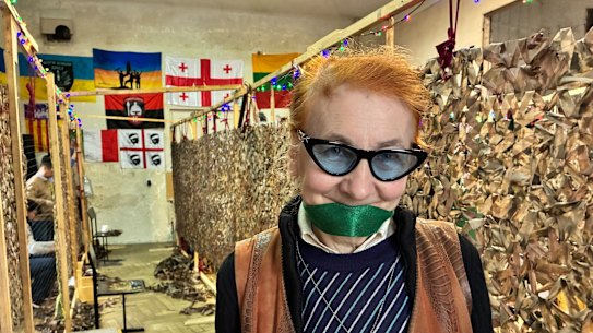 Nina Synyakivych, a retired teacher, who leads the volunteers in what has become an essential task: making camouflage nets for the army.