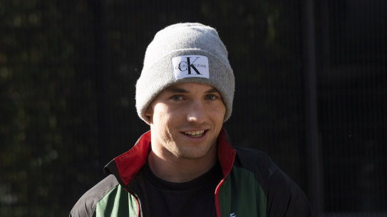 A smiling Cameron Murray returns to Redfern on Monday morning.
