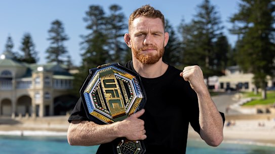 Perth UFC champion Jack Della Maddalena poses in Cottesloe after returning home with the UFC Welterweight Championship belt.