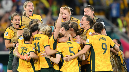 Australia celebrate their side’s victory in the penalty shoot out.