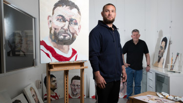 Roosters player Jared Waerea-Hargreaves with artist Harley Oliver and his portrait.