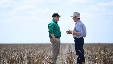 Prime Minister Scott Morrison with farmer David Gooding on his drought-affected property near Dalby, Queensland.