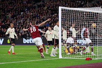 West Ham players celebrate after their opening goal.