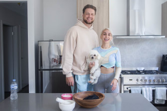 Gina Cerasiotis, her partner Kyle Galloway and Teddy.