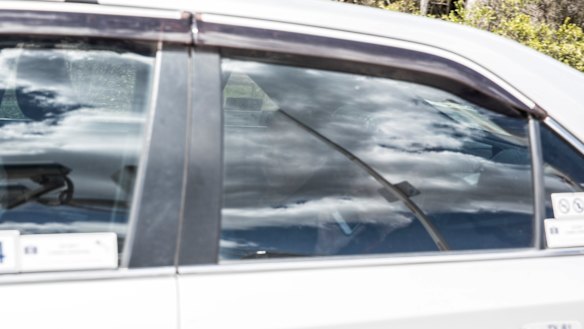 Former ABC boss Michelle Guthrie leaves Parliament House in a taxi via the loading dock.
