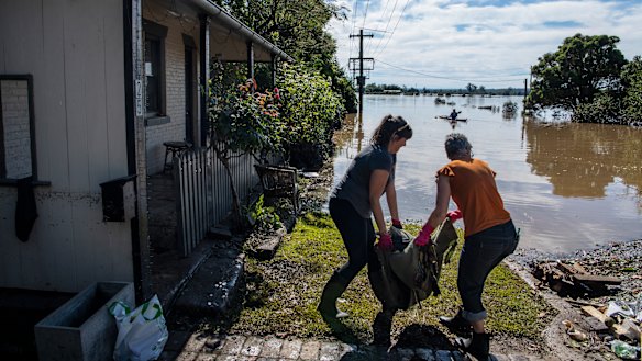 Windsor residents clean up in the aftermath of the devastating weather event.