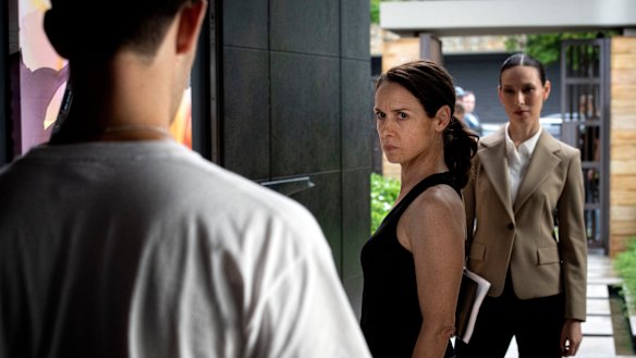 Kate Atkinson as Melissa Caddick, with Ursula Mills as ASIC officer Phoebe (right) and Jerome Velinsky (left) as Anthony Koletti.