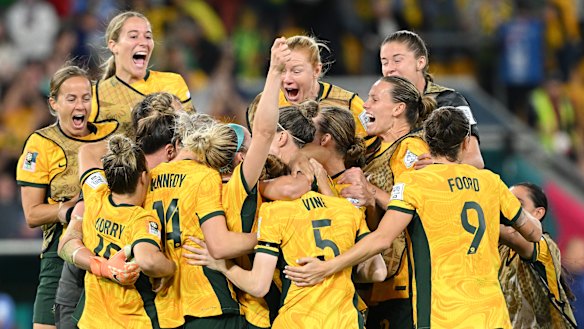 Australia celebrate their side’s victory in the penalty shoot out.