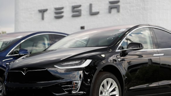 Tesla shares continue to slide. 