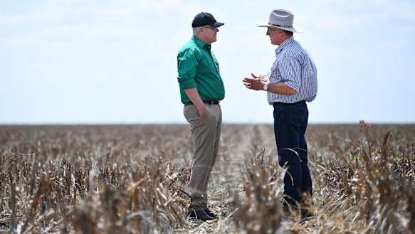 Prime Minister Scott Morrison with farmer David Gooding on his drought-affected property near Dalby, Queensland.