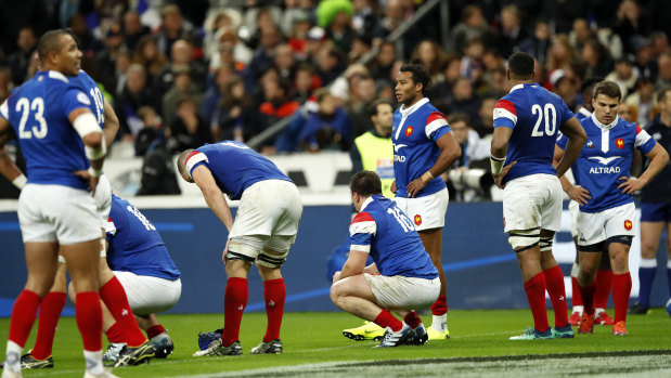 Sacre bleu: French players following the full-time whistle.