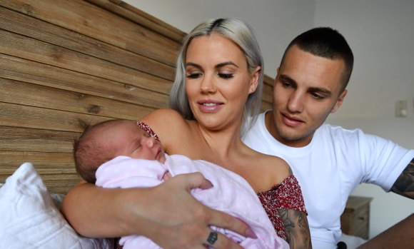 Sammy Stokes and her partner Andy with their nine-days-old girl Sunny. 