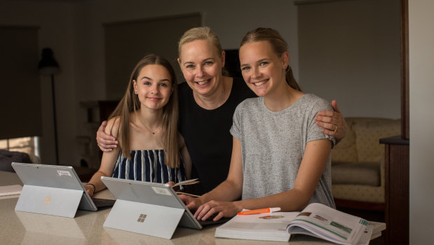 Rachael Jakubik with daughters Ella, 14, and Caitlin, 17, who go to Donvale Christian College. 