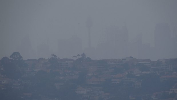 Smoke blankets the city on Friday morning.