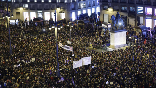 Hundreds of protesters packed the Puerta del Sol downtown square. 