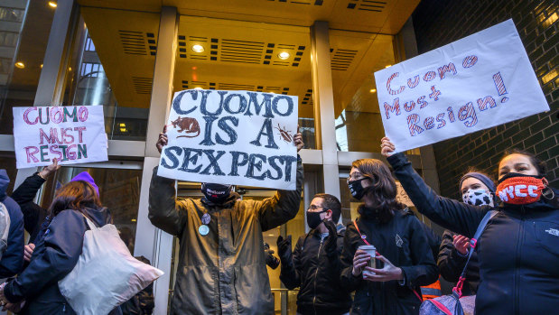 Demonstrators rally for New York Governor Andrew Cuomo’s resignation in front of his Manhattan office in New York.