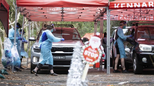 Sydneysiders line up to be tested at a pop-up clinic at Frenchs Forest in Sydney.