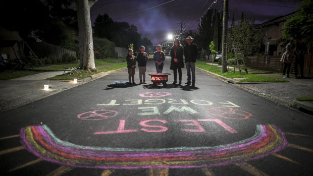 Mark Di Pasquale's daughters wrote 'lest we forget' in chalk on the street.