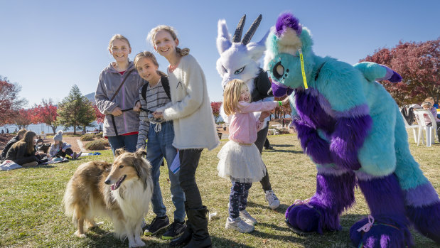 Olive Goode (13), Kyra Saliba (12), Grace Bullen (12) with rough collie Purdy and five-year-old Alice Francis with furries Cutea and Sky.