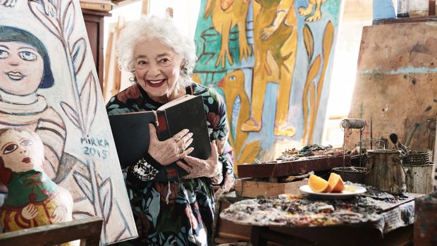 The late artist Mirka Mora in her studio in Richmond, wearing the Gorman dress she collaborated on. 