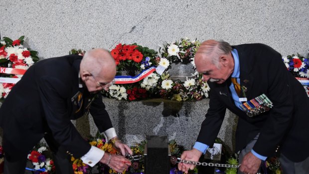 Wreaths are laid in Martin Place during the Anzac Day dawn service.