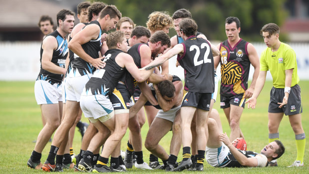 Belconnen Magpies players take exception to a tackle on Luke Donohoe from Queanbeyan's Joshua Bryce.